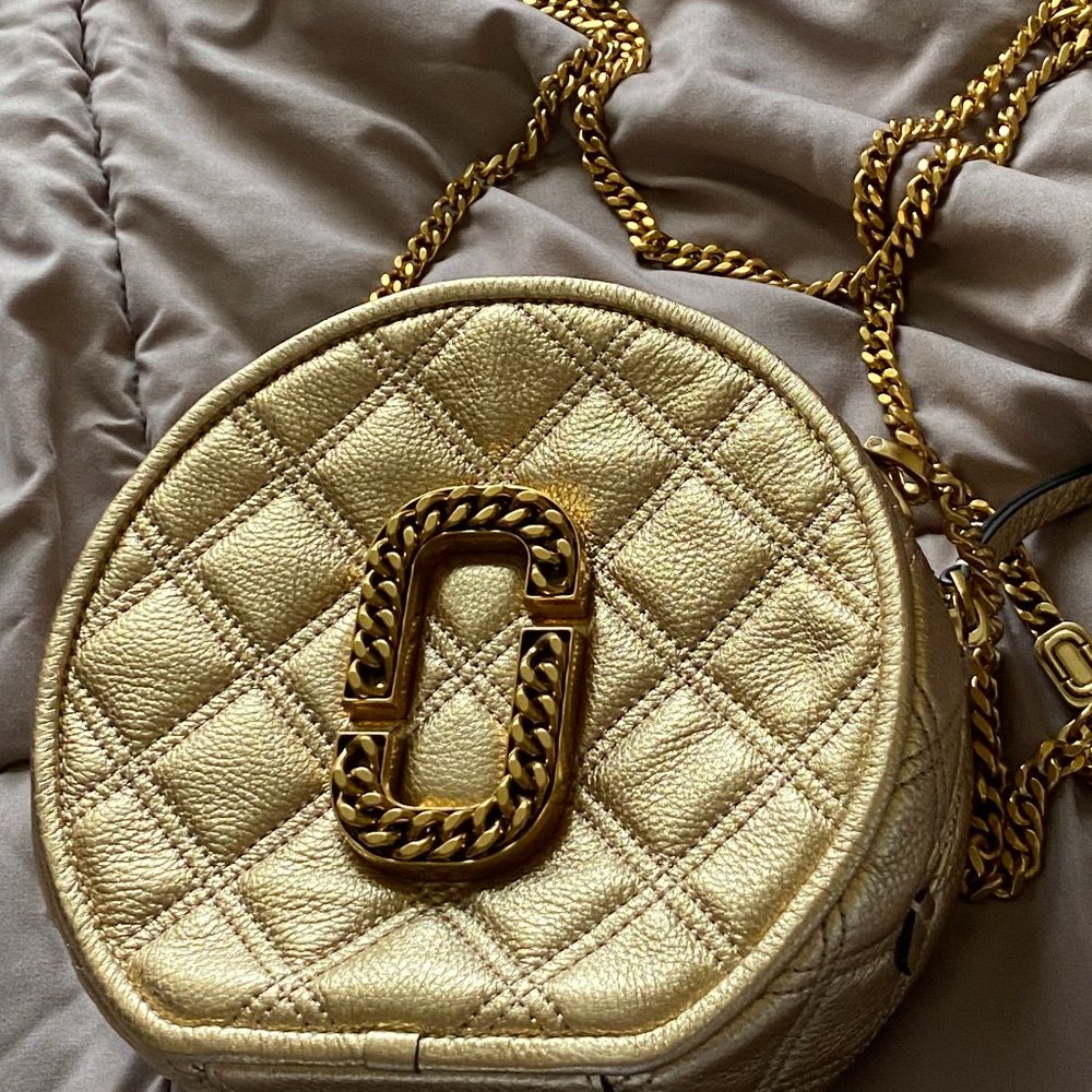 Round Gold quilted leather crossbody bag from MJ